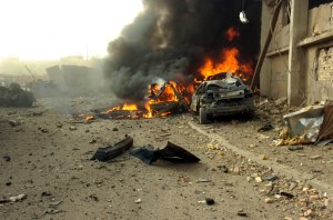 Waziriya, Iraq (Aug. 27, 2006) - A Vehicle Born Improvised Explosive Devise (VBIED) after exploding on a street outside of the Al Sabah newspaper office in the Waziryia district of Baghdad, Iraq. The VBIED destroyed more than 20 cars, killing two people and wounding as many as 30. U.S. Navy photo by Mass Communication Specialist 2nd Class Eli J. Medellin (RELEASED)